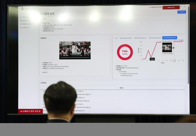 Minister of the Interior and Safety Yoon Ho-jung observes a demonstration of fake news detection technology at campaign sites during the AI Deepfake Detection and Analysis Model Demonstration at the Government Complex Seoul March 10 2026 Yonhap