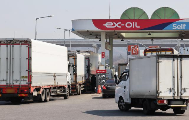 Cargo truck drivers are refueling at the gas station of Yongin Rest Area on the Yeongdong Expressway in Yongin Gyeonggi Province on March 10 2026 Yonhap 