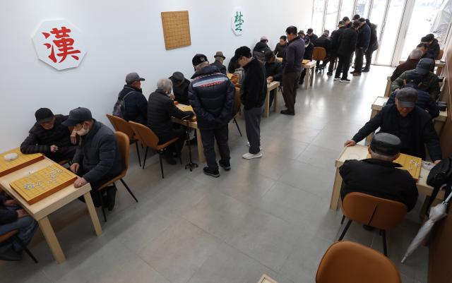 Seniors play janggi at Tapgol Senior Culture Playground in Jongno-gu Seoul March 11 2026 AJP Han Jun-gu