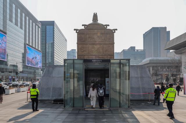 Visitors enter the “Sejong Story” exhibition hall behind the statue of King Sejong at Gwanghwamun Square in Seoul on Feb 20 2026 AJP Yoo Na-hyun