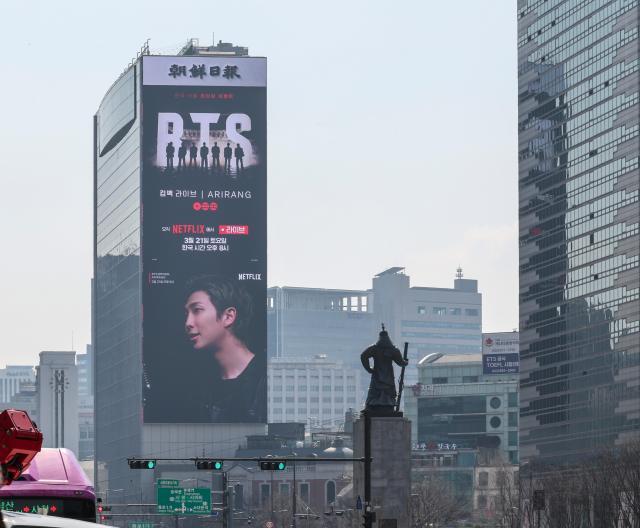 A promotional video for a BTS concert scheduled for March 21 plays on an electronic billboard at the Koreana Hotel near Gwanghwamun Square in Seoul on March 12 2026 AJP Yoo Na-hyun 20260312