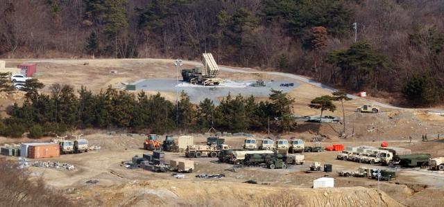 A launcher of the US Terminal High Altitude Area Defense THAAD missile defense system is pointed toward the sky at a US base in Seongju County North Gyeongsang Province on Mar 5 2026 Yonhap 
