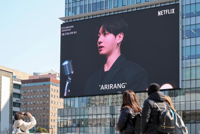 An electronic billboard near Gwanghwamun Square in central Seoul displays an advertisement for BTS’s comeback live concert on March 13 2026 eight days before the performance AJP Yoo Na-hyun 20260313
