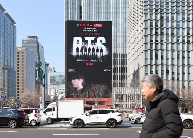 An electronic billboard near Gwanghwamun Square in central Seoul displays an advertisement for BTS’s comeback live concert on March 13 2026 eight days before the performance AJP Yoo Na-hyun 20260313