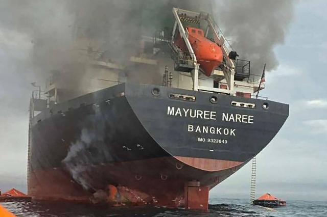 This handout photo taken on March 11 2026 and released by the Royal Thai Navy shows smoke rising from the Thai bulk carrier Mayuree Naree near the Strait of Hormuz after an attack A Thai bulk carrier travelling in the crucial Strait of Hormuz was attacked March 11 with 20 crew members rescued so far the Thai navy said AFPYonhap