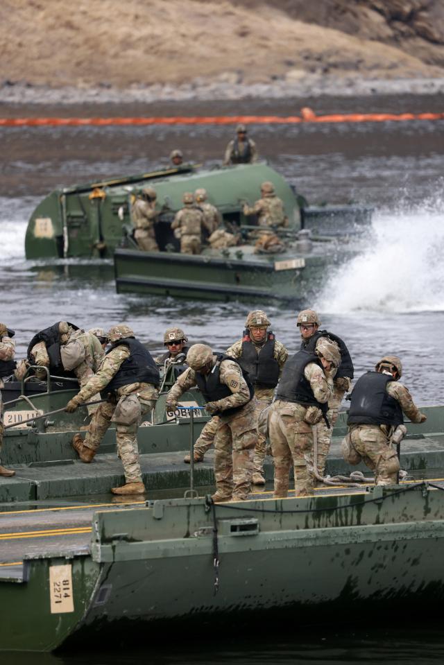US Army soldiers take part in a US-South Korea joint river-crossing exercise which is a part of the annual Freedom Shield joint military training near the demilitarized zone separating South and North Korea in Yeoncheon South Korea Mar 14 2026 Reuters-Yonhap 