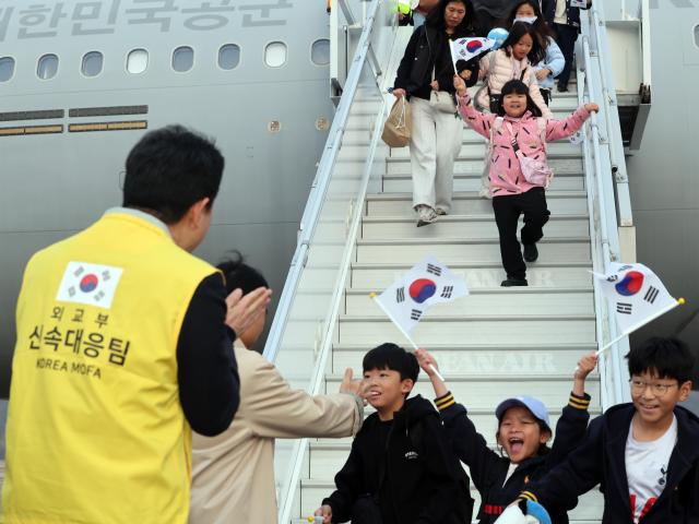 Korean residents returning from the Middle East on a military multipurpose transport aircraft due to worsening conditions in the region walk at Seoul Airport in Seongnam Gyeonggi Province on the afternoon of March 15 2026 Yonhap
