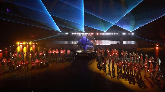 A celebratory performance takes place during the closing ceremony of the 2026 Milan-Cortina Winter Paralympics at the Cortina Curling Olympic Stadium in Cortina dAmpezzo Italy on March 15 2026 Yonhap 20260315
