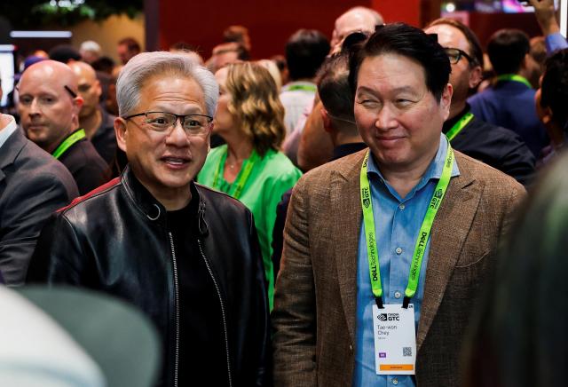 NVIDIA CEO Jensen Huang and SK Group Chairman Chey Tae-won at the NVIDIA GTC global AI conference Reuters-Yonhap