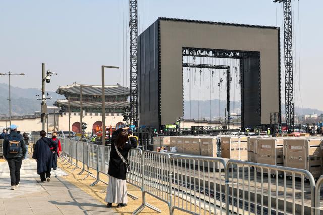 Stage installation is underway at Gwanghwamun Square in Jongno District central Seoul four days ahead of the Gwanghwamun performance by K-pop group BTS on March 17 2026 AJP Yoo Na-hyun 20260317