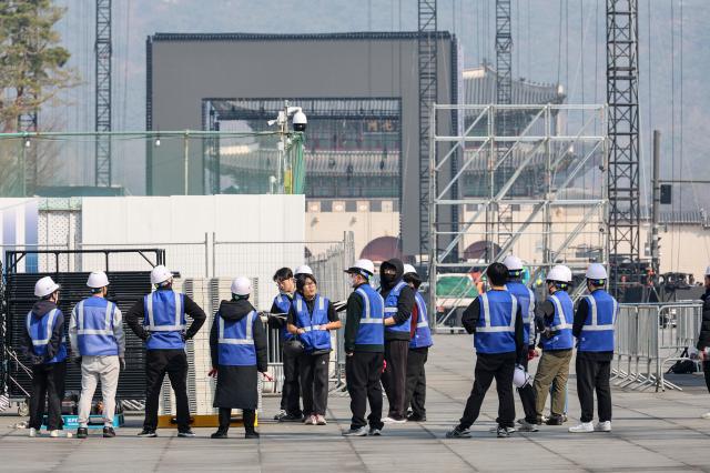 Stage installation is underway at Gwanghwamun Square in Jongno District central Seoul four days ahead of the Gwanghwamun performance by K-pop group BTS on March 17 2026 AJP Yoo Na-hyun 20260317