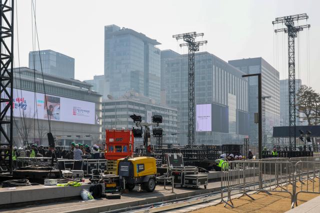 Stage installation is underway at Gwanghwamun Square in Jongno District central Seoul four days ahead of the Gwanghwamun performance by K-pop group BTS on March 17 2026 AJP Yoo Na-hyun 20260317
