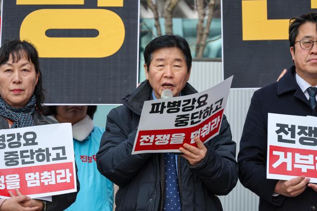 An emergency press conference by Seoul civic groups opposing a possible deployment to the Strait of Hormuz and war is held in front of the KT building in Gwanghwamun central Seoul March 17 2026 AJP Yoo Na-hyun 20260317