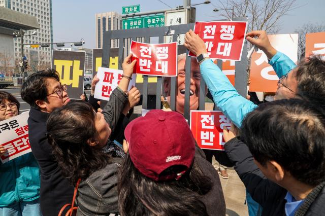 Activists rally in Seoul to oppose warship dispatch to Middle East