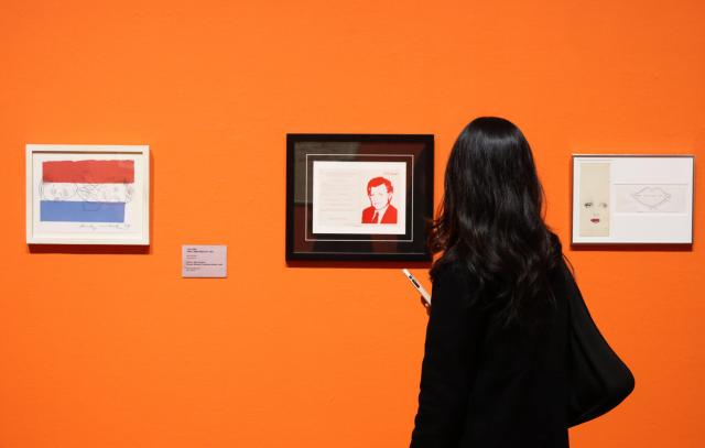 A visitor views an Andy Warhol artwork at Daejeon Museum of Art in Mannyeon-dong Seo-gu Daejeon March 17 Yonhap