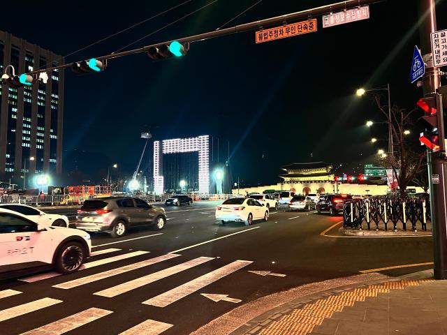 Preparation for BTS Concert continued on throughout the night with light fixtures being installed and stage light testing session AJP Joonha YOo March 17 2026