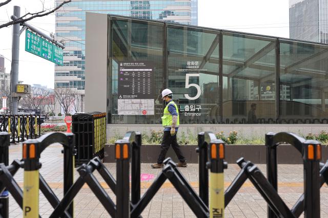 Entrances to Gwanghwamun Station are being prepared for partial closure with access routes expected to be selectively restricted to manage crowd inflow AJP Han Jung-gu March 18 2026