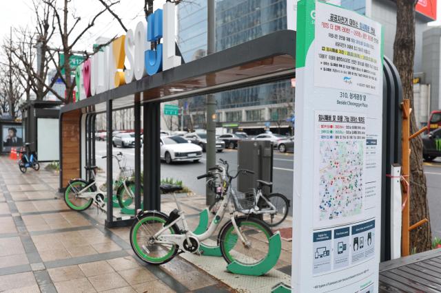 Public bike stations near the venue show signs of temporary shutdown with rental docks cleared or marked for restricted use during the event period AJP Han Jung-gu March 18 2026