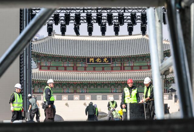 Stage installation is underway at Gwanghwamun Square in Jongno District Seoul three days ahead of the BTS performance March 18 2026 AJP Yoo Na-hyun 20260318