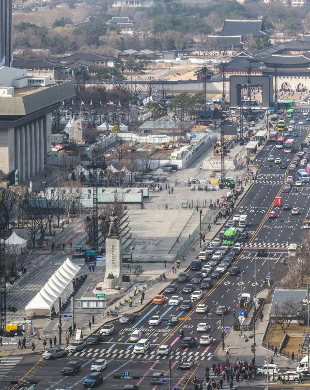 Stage installation is underway at Gwanghwamun Square in Jongno District Seoul three days ahead of the BTS performance March 18 2026 AJP Yoo Na-hyun 20260318
