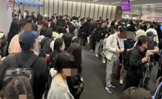 This photo captured from kpopdankdramaid on X show visitors lined up at the Incheon International Airport in order to enter into Korea 