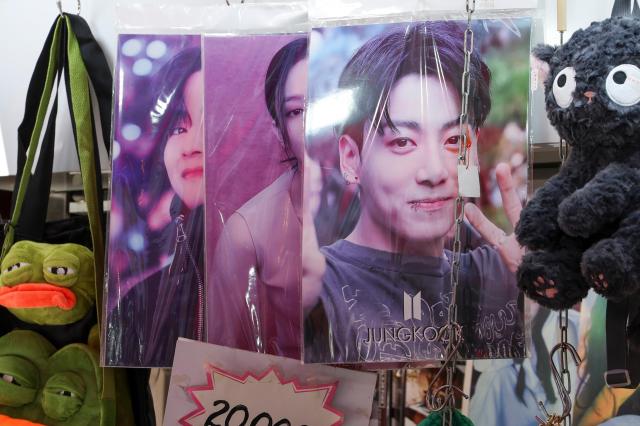 Unofficial BTS goods alongside other K-pop artists are being sold at gift shops across Seoul AJP Yoo Na-hyun