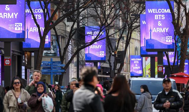 Banners welcoming BTS and ARMY line a street in Myeongdong central Seoul on March 19 2026 AJP Yoo Na-hyun