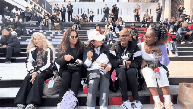 International fans pose at Gwanghwamun Square in Seoul on March 20 2026 ahead of the BTS concert AJP Ryu Yuna
