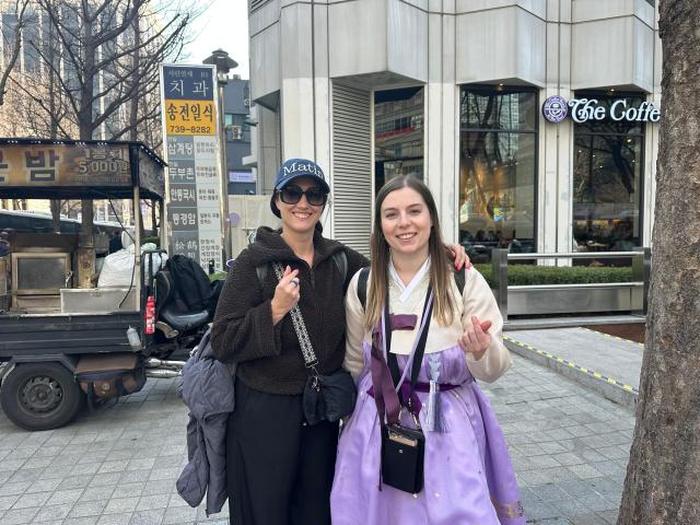 Australians Kim Suda 42 and Emily Monro 27 struck friendship while roaming around the perimeter on March 21 2026 Kim Hee-su AJP