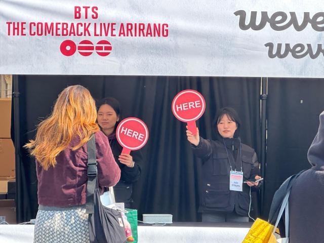 Global fans throng merchandise booths as BTS prepares return