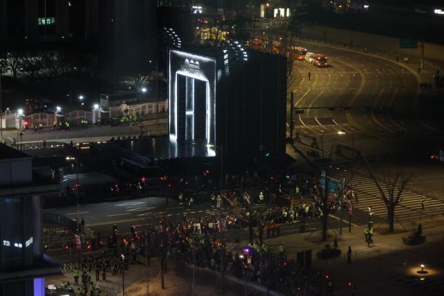 Crowds released from BTS comeback concert in central Seoul move out of the concert area on March 21 AJP Yoo Na-hyun