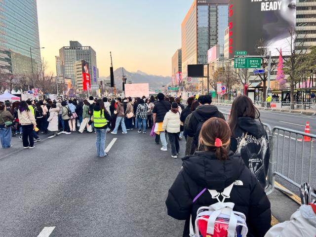 ARMYs line up to enter the venue at Gwanghwamun Plaza in Seoul March 21 2026 AJP Yoo Joon-ha