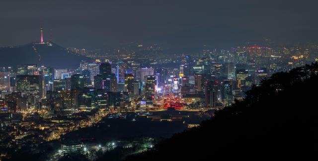 BTS performs BTS THE COMEBACK LIVE ARIRANG at Gwanghwamun Plaza in Seoul on the evening of March 21 2026 Yoo Dae-gil