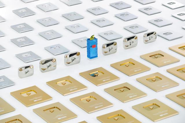 This photo provided by Pinkfong Company show couple of the plaques received from Youtube through their original IP