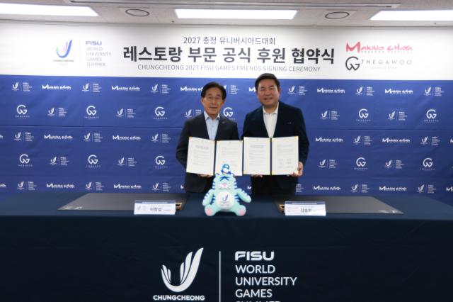 협약식왼쪽부터 조직위 이창섭 부위원장 김승희 대표이사사진