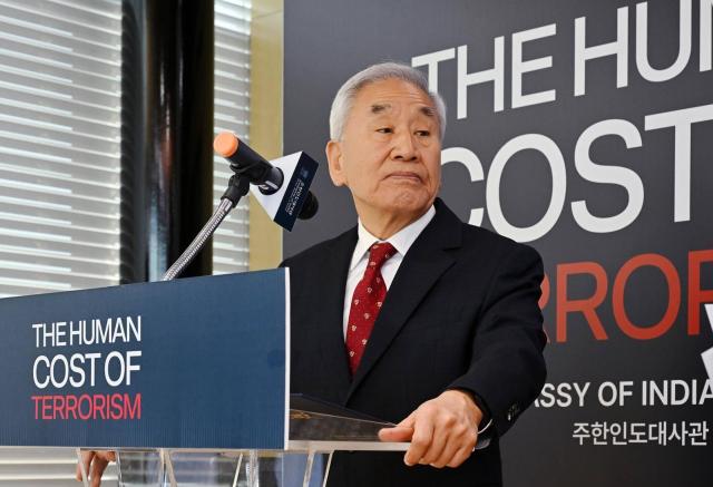 Lee Jae-oh president of the Korea Democracy Foundation delivers welcome remarks at the opening ceremony of the Human Cost of Terrorism digital exhibition at the National Museum of Korean Democracy in Seoul on March 24 2026 