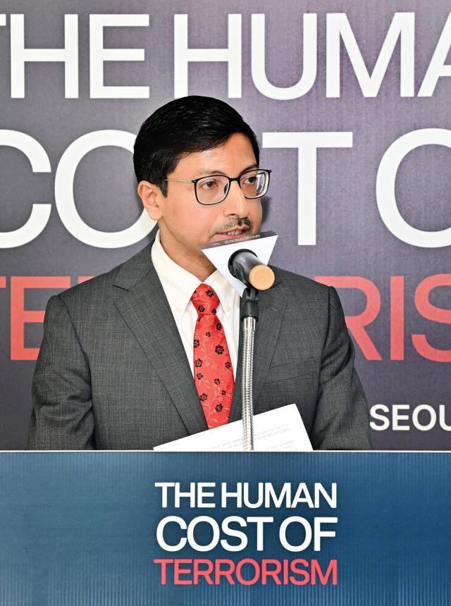 Gourangalal Das Indian Ambassador to South Korea delivers a keynote address during the Human Cost of Terrorism exhibition at the National Museum of Korean Democracy in Seoul on March 24 2026