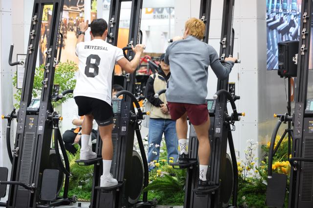 Booth staff demonstrate exercises at SPOEX 2026 at COEX in Samseong-dong Gangnam-gu Seoul March 26 2026 AJP Han Jun-gu
