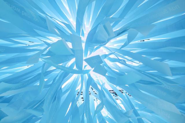 A “BTS Sound Cube” installation is set up at the courtyard of MMCA Seoul in Jongno District Seoul on March 26 Lyrics from “SWIM” are written on each blue ribbon AJP Yoo Na-hyun