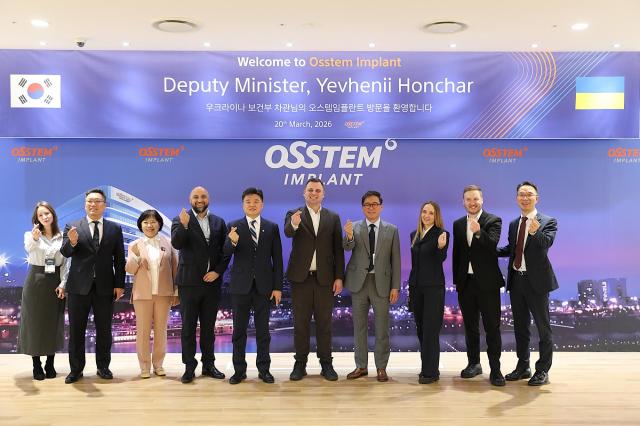 A Ukrainian delegation led by Deputy Health Minister Yevhen Honchar (sixth from left) visits Osstem Implant’s Twin Tower headquarters in Seoul on March 20. Photo provided by Osstem Implant.