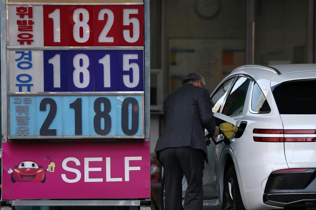 Gasoline and diesel prices are displayed at a gas station in Seoul on Thursday March 26 2026 Yonhap