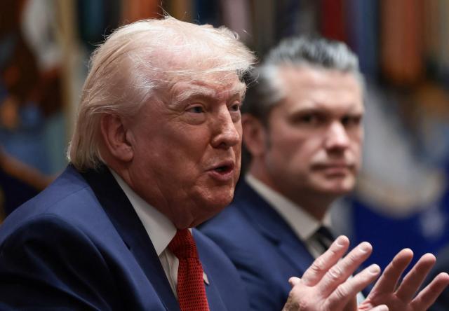 US President Donald Trump speaks next to Defense Secretary Pete Hegseth during a cabinet meeting at the White House in Washington DC on March 26 2026Reuters-Yonhap
