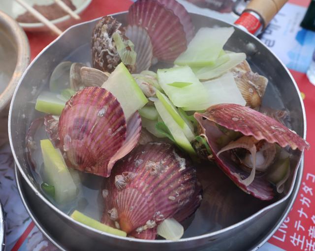 Jogaetang clam soup a signature dish of the pojangmacha street is displayed in Yeongdo-gu Busan March 28 2026 AJP Han Jun-gu