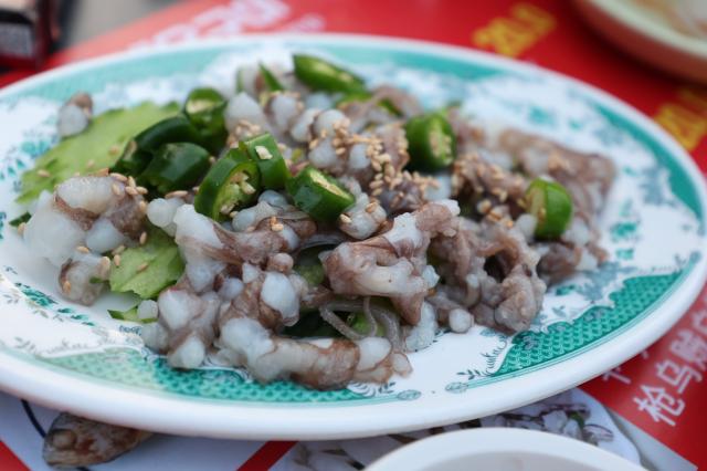 San-nakji live octopus a signature dish of the pojangmacha street is displayed in Yeongdo-gu Busan March 28 2026 AJP Han Jun-gu