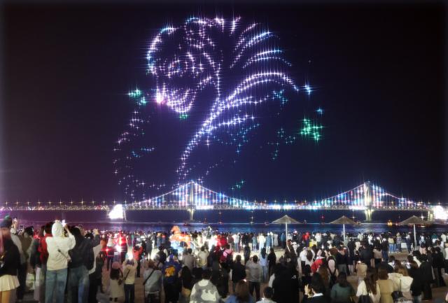 Drones perform a light show themed Legendary Guardians at Gwangalli Beach in Suyeong-gu Busan March 28 2026 Yonhap