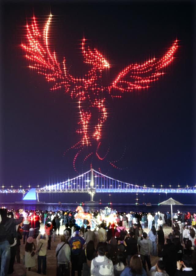 Drones perform a light show themed Legendary Guardians at Gwangalli Beach in Suyeong-gu Busan March 28 2026 Yonhap