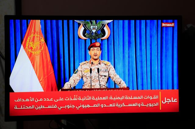 Houthi military spokesman Yahya Sarea announces a new attack on Israel via a televised statement in Sanaa Yemen on March 28 2026 EPA-Yonhap