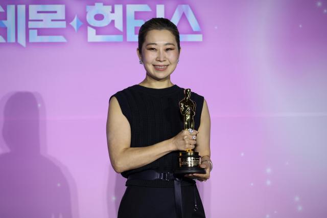 Director Maggie Kang poses during a press conference celebrating the Academy Award win of the Netflix film K-Pop Demon Hunters at CGV I’Park Mall in Yongsan Seoul on April 1 2026 AJP Yoo Na-hyun