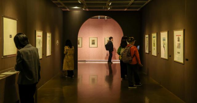 A visitor views works at the Kim Sang-yu centennial exhibition “Unworn” at the Seoul Museum in Jongno District Seoul March 31 2026 AJP You Na-hyun 20260331
