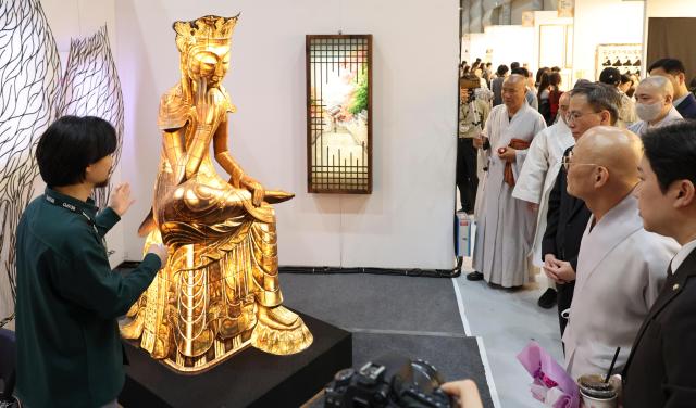 Visitors look around the exhibition hall during the 2026 Seoul International Buddhism Expo at COEX in Seoul’s Gangnam district on April 2 AJP Yoo Na-hyun